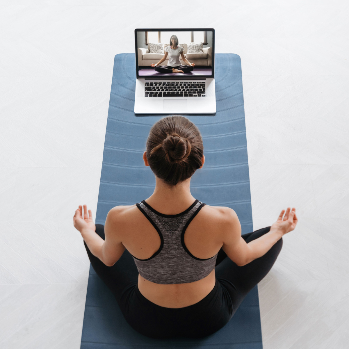 An employee joins virtual Houston fitness classes without losing the benefits of Houston personal training.