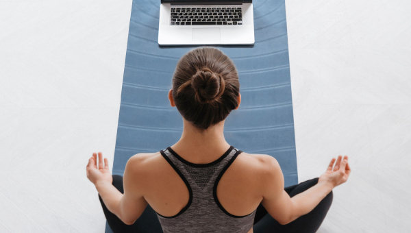 An employee joins virtual Houston fitness classes without losing the benefits of Houston personal training.